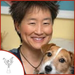 A photo of Dr. Yin, a woman with short, spiky brown hair. She is holding a small brown and white dog. The podcast logo is on the lower left.
